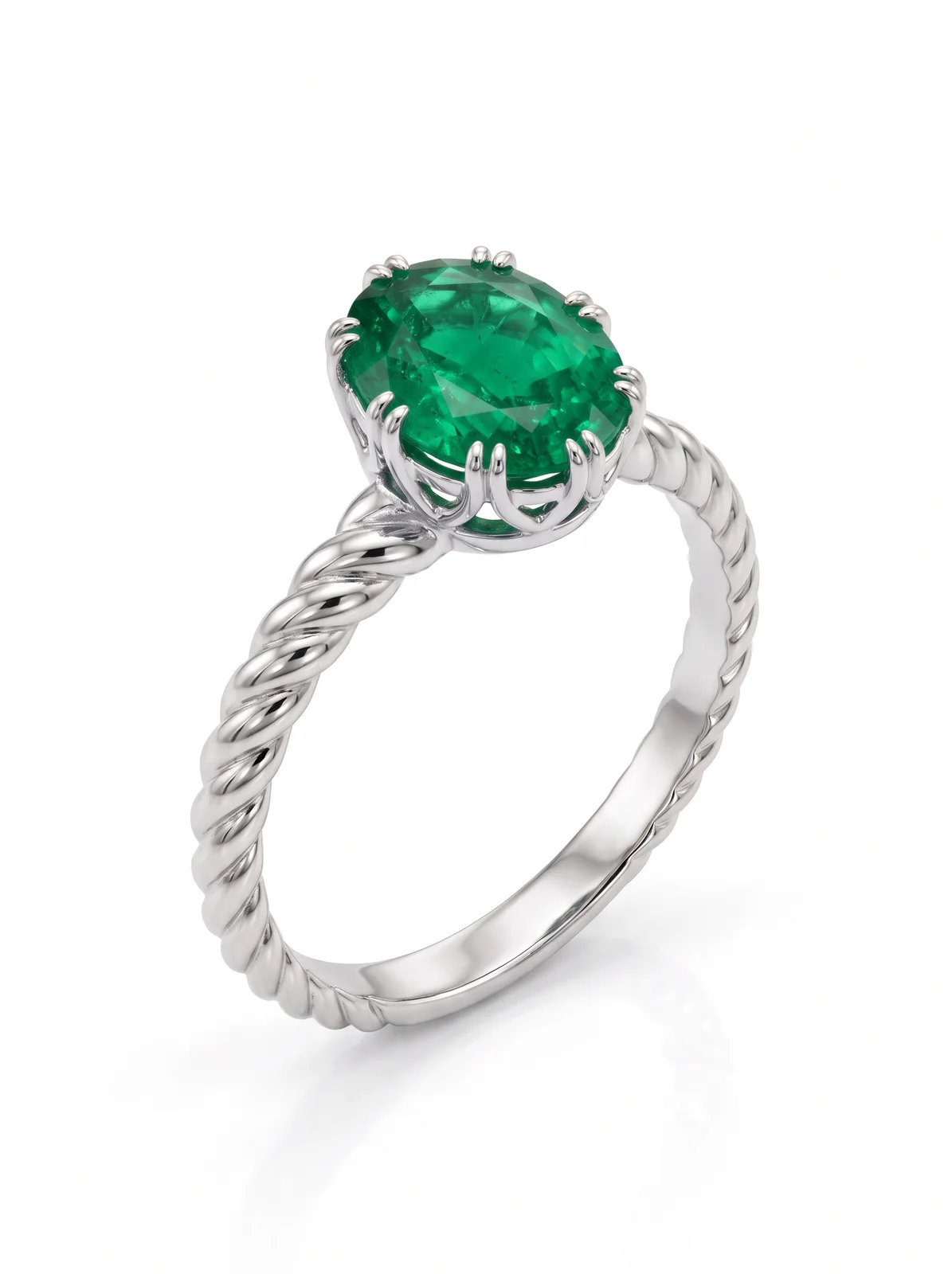 La même bague transformée par l'IA en platine avec une émeraude